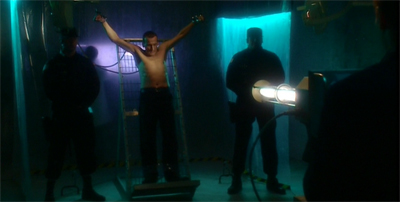 Don't ask me why he has to be topless for the machine to work...