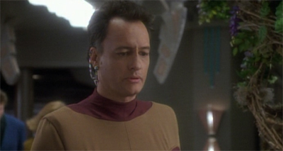 Q's attempts to blend in are flawless...