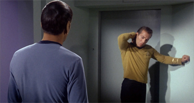 Jim's really angling for that special "Vulcan Back Rub"...