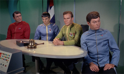 "See, Bones, I told you that court martial bell was an expense that we could justify... And you said we'd be lucky to use it once!"