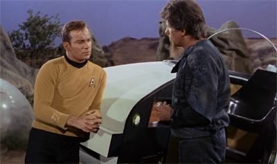 If we're going to listen to more exposition, Kirk might as well make himself comfortable...