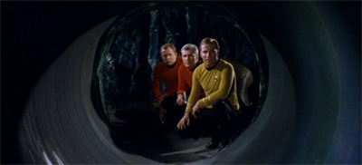 I like how the red shirts are smart enough to stand behind Kirk...