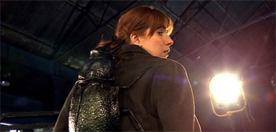 There's something on her back...