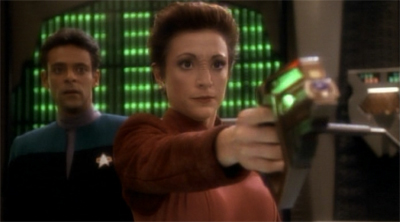 Kira prepares to void the station's warranty...