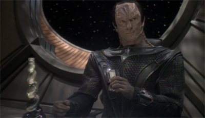 Dukat needs a stiff drink to help him process this plot...
