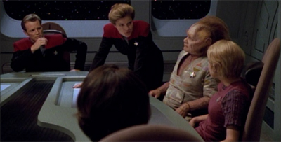 It's weird how comfortable Janeway is with Paris sitting in her chair...