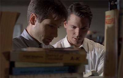 "Quick! To the bookshelf!"