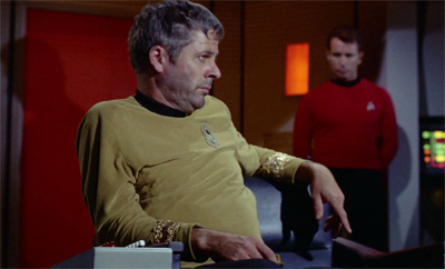 I have to admit, if I ever had to sit in the command chair, I'd probably sit like that...