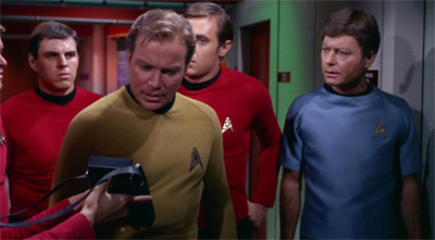 Holding Kirk's tricorder is possibly the safest assignment that a red shirt could ask for...