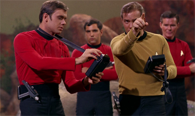 "You! Anonymous red shirt! Investigate that strange noise!" Kirk demonstrates finely-honed survival skills.