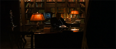 "Why yes, I specifically asked my secretary to light the room to make me appear as ominous as possible."