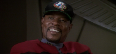 I like the idea that Sisko keeps a box full of baseball caps under his desk. "For emergencies."