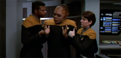"Hands off the threads. I just got done putting Tuvok and Neelix's outfits through a transporter accident."
