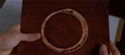 "Hey, Scully! That looks just like your tattoo--" "Shut up, Mulder."