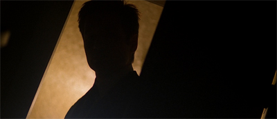 Because it's just not Millennium without a creepy silhouette moving through a door and down some steps into the basement...