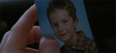 "This? Oh, it's just my own primary school photos. I wonder why I don't smile like that anymore."