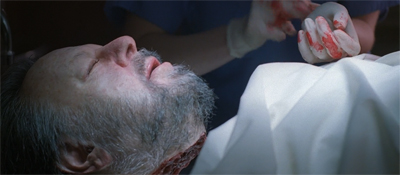 Sawing himself in two...