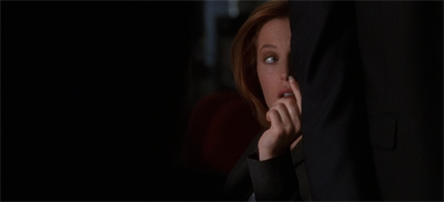 Hold him back, Scully...