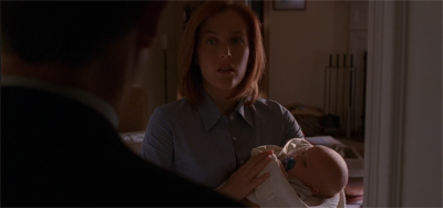 Scully is left, quite literally, holding the baby.