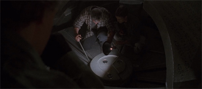 Yes, they are trying to jimmy the lock on an alien ship. The mythology has come to this.