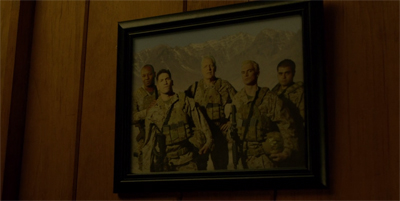 "You know, I should really stop hanging pictures of criminal murderers in my study while having the press over..."