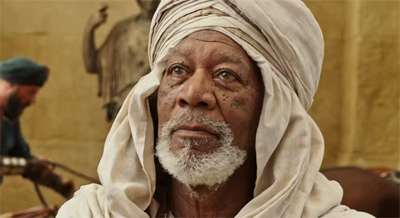 Yes, he does narrate the film. Why do you ask?