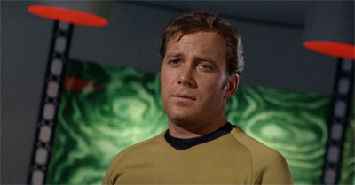 Beaming with excitement.