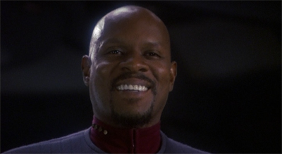 Fortune smiles upon Sisko, and Sisko smiles back.