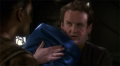 Left holding the baby.