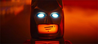 Masking his emotions.